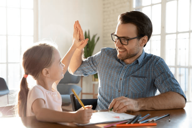 father and daughter doing homeowork